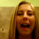A pretty blonde girl films herself pooping in a public restroom toilet stall. You can hear the plop, and then she video records her friend sitting on the toilet in the next stall. Mainly audio here, and not really visible "action".
